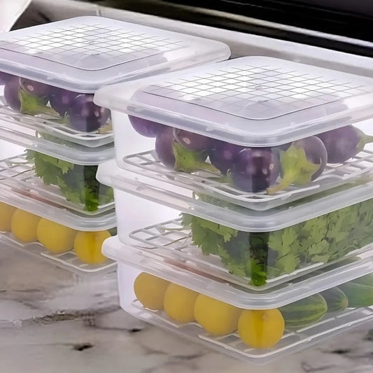 Stack of transparent food storage containers with vegetables inside on a marble countertop.