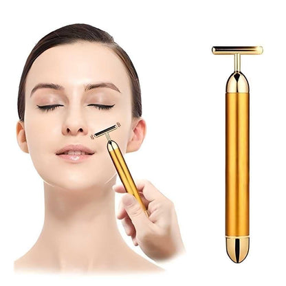 Woman using a gold facial roller on her face with a close-up of the device on a white background.
